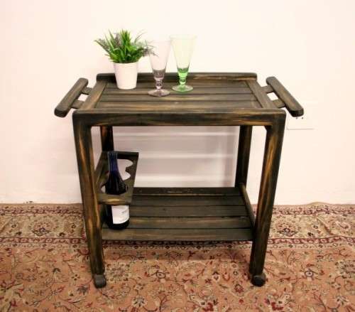 A lovely shabby chic drinks/ tea trolley on castors in good condition - awesome in informal areas!
