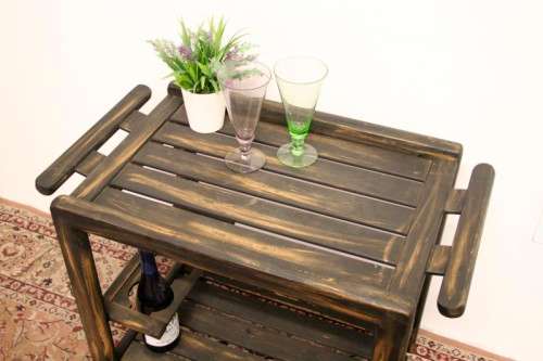A lovely shabby chic drinks/ tea trolley on castors in good condition - awesome in informal areas!