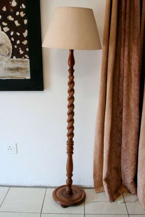 An exquisite tall solid Teak Barley-twist floor lamp with a large shade in working order