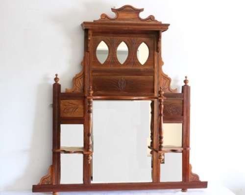 A beautiful antique Edwardian hand carved mahogany wall-mountable "over" mantle mirror