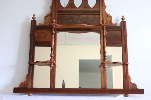 A beautiful antique Edwardian hand carved mahogany wall-mountable "over" mantle mirror