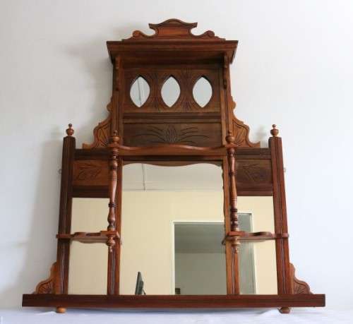 A beautiful antique Edwardian hand carved mahogany wall-mountable "over" mantle mirror