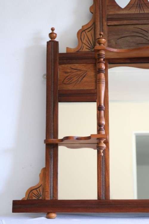 A beautiful antique Edwardian hand carved mahogany wall-mountable "over" mantle mirror