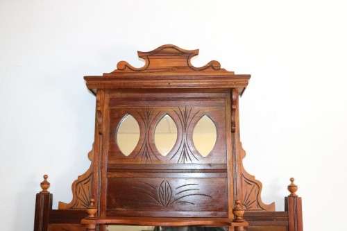 A beautiful antique Edwardian hand carved mahogany wall-mountable "over" mantle mirror