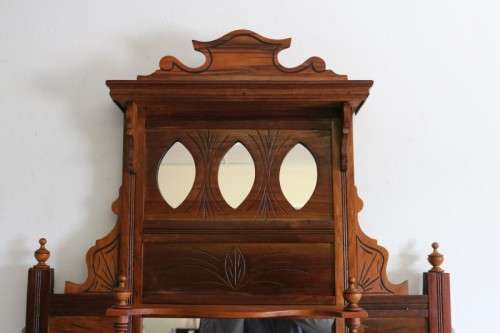 A beautiful antique Edwardian hand carved mahogany wall-mountable "over" mantle mirror