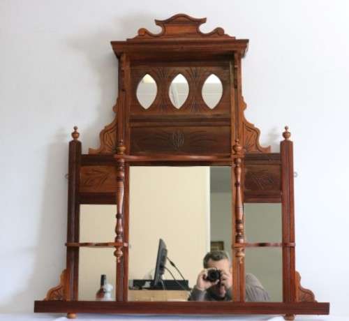 A beautiful antique Edwardian hand carved mahogany wall-mountable "over" mantle mirror
