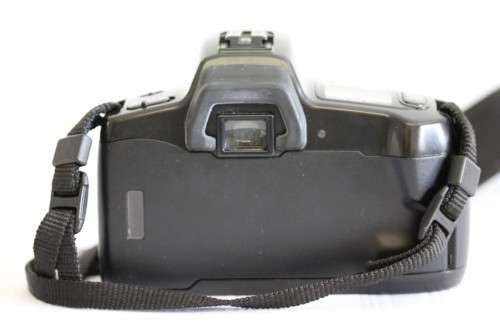 **RS17** A Minolta Dynax 300si 35mm film camera with a AF 35-70mm lens in a bag