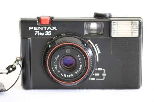 A Pentax Pino 35 fixed focus film camera in a bag in good condition - wonderful camera!