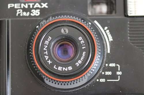 A Pentax Pino 35 fixed focus film camera in a bag in good condition - wonderful camera!