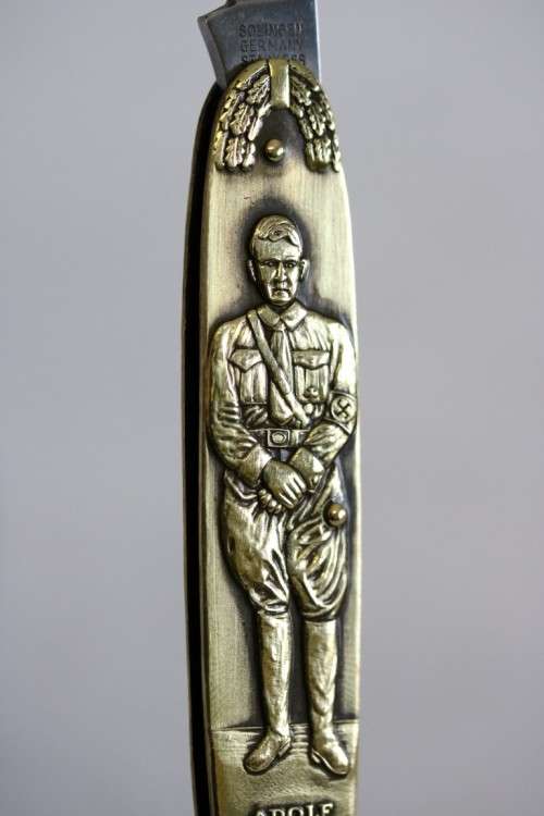 A well-made brass "Solingen, Germany" pocket knife depicting Adolf Hitler - in very good condition!
