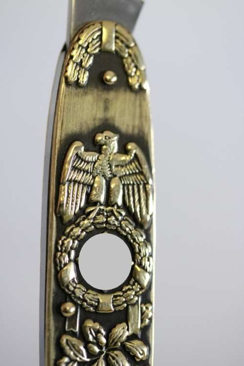 A well-made brass "Solingen, Germany" pocket knife depicting Adolf Hitler - in very good condition!