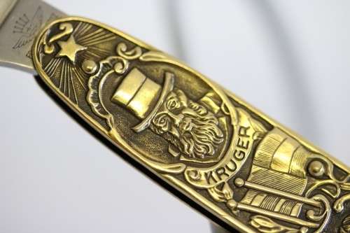A well-made brass "Solingen, Germany" pocket knife depicting Paul Kruger and "Eendracht Maakt Macht"