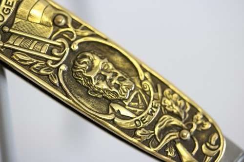 A well-made brass "Solingen, Germany" pocket knife depicting Paul Kruger and "Eendracht Maakt Macht"
