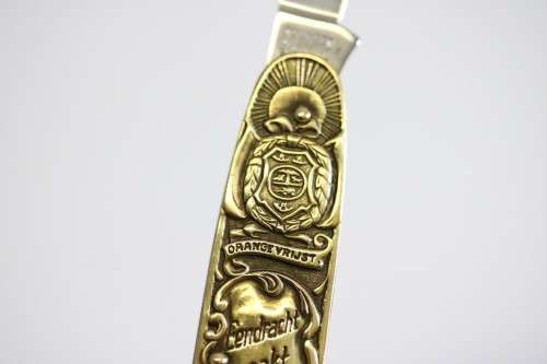 A well-made brass "Solingen, Germany" pocket knife depicting Paul Kruger and "Eendracht Maakt Macht"