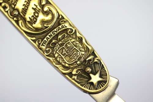 A well-made brass "Solingen, Germany" pocket knife depicting Paul Kruger and "Eendracht Maakt Macht"