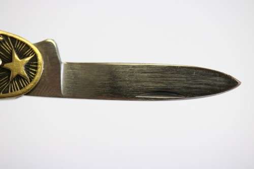 A well-made brass "Solingen, Germany" pocket knife depicting Paul Kruger and "Eendracht Maakt Macht"