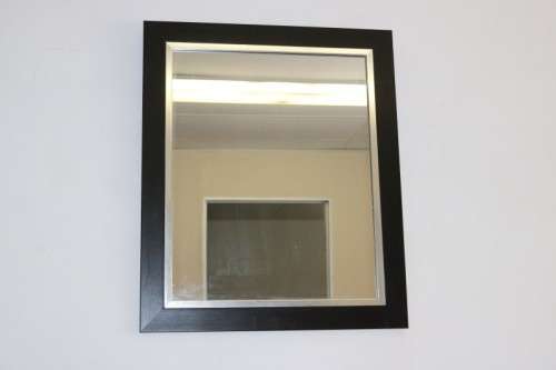 A stylish modern dark wood rectangular wall mirror with brushed steel detailing -  RS17M