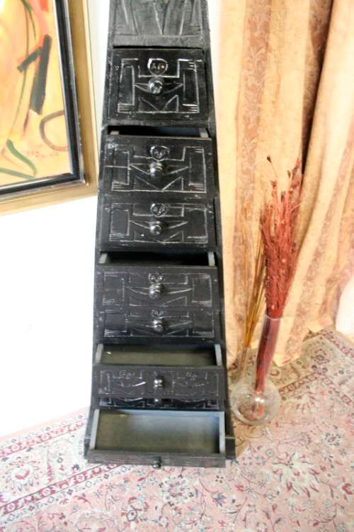 An extraordinary, tall Indonesian pyramid chest of drawers with beautiful carved detailing - amazing