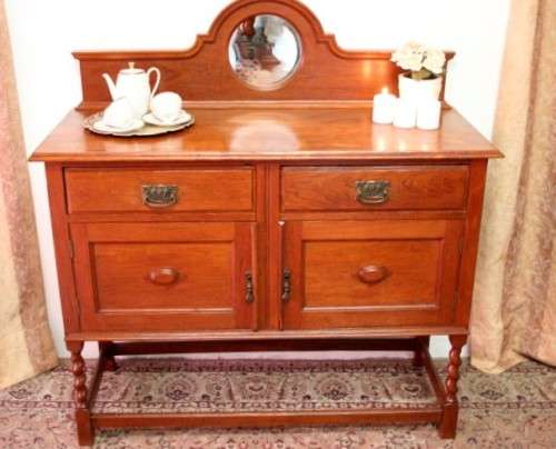 A stunning antique oak side server cabinet with a bevelled mirror, loads of drawer & cupboard space
