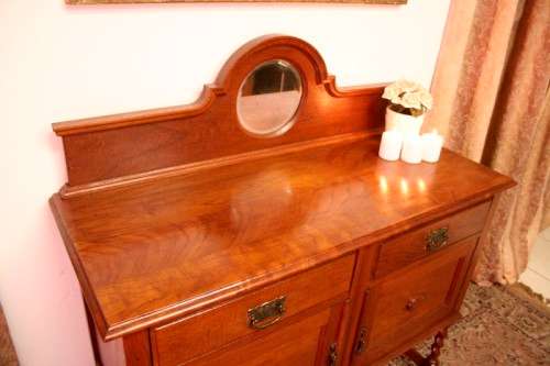 A stunning antique oak side server cabinet with a bevelled mirror, loads of drawer & cupboard space