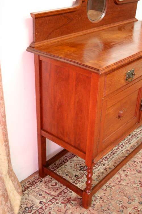 A stunning antique oak side server cabinet with a bevelled mirror, loads of drawer & cupboard space