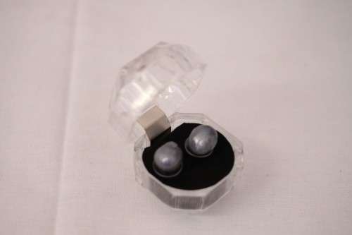 A stunning pair of black cultured baroque pearl earrings in a gorgeous see-through gift box