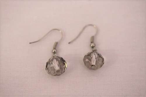 **RS17** A boxed pair of smokey quartz coloured glass-crystal ladies earrings in beautiful condition