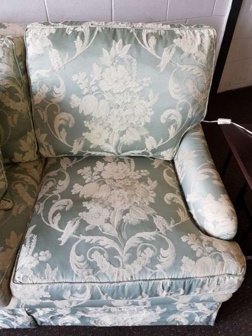 A wonderful vintage "Moorgas & Sons" Brocade fabric couch with cushions and a floral pattern on it!!