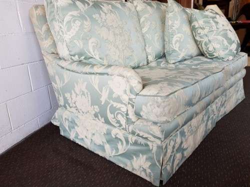 A wonderful vintage "Moorgas & Sons" Brocade fabric couch with cushions and a floral pattern on it!!