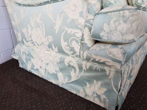 A wonderful vintage "Moorgas & Sons" Brocade fabric couch with cushions and a floral pattern on it!!