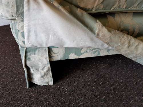 A wonderful vintage "Moorgas & Sons" Brocade fabric couch with cushions and a floral pattern on it!!