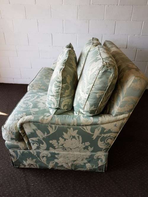 A wonderful vintage "Moorgas & Sons" Brocade fabric couch with cushions and a floral pattern on it!!