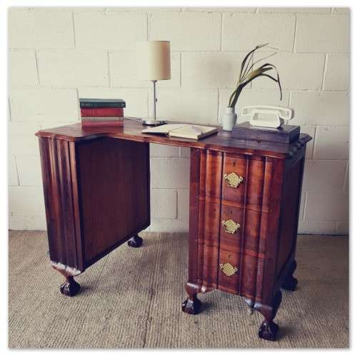 A very charming vintage Imbuia Ball and Claw desk with 3x spacious drawers, shelf and brass handles!