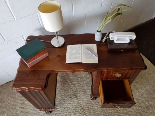 A very charming vintage Imbuia Ball and Claw desk with 3x spacious drawers, shelf and brass handles!