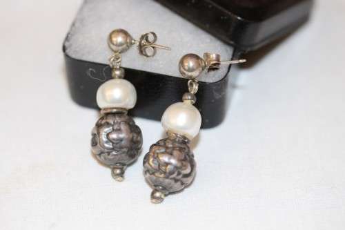 A beautiful pair of Vintage styled genuine cultured baroque pearl and ornate silver beaded earrings