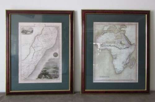 Detailed maps of Africa and Natal framed behind glass in great condition.