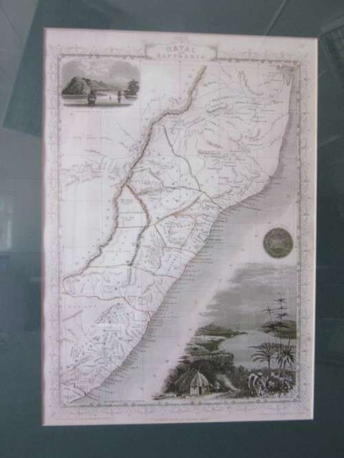Detailed maps of Africa and Natal framed behind glass in great condition.