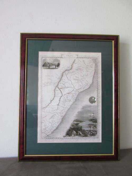 Detailed maps of Africa and Natal framed behind glass in great condition.