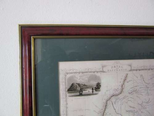 Detailed maps of Africa and Natal framed behind glass in great condition.
