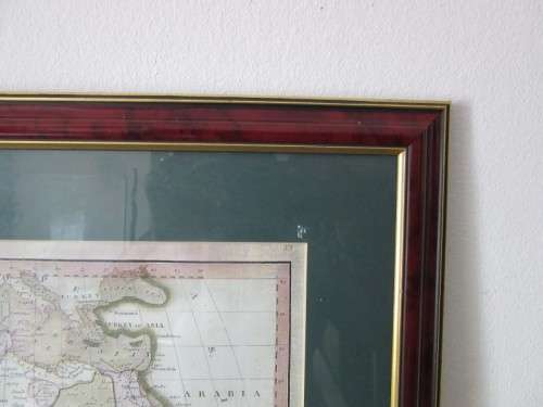 Detailed maps of Africa and Natal framed behind glass in great condition.
