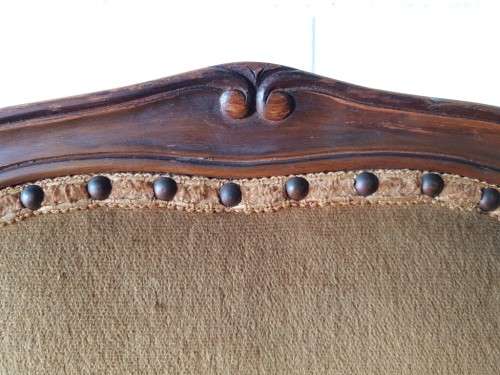 An amazing and unusual antique Mahogany bar chair with long legs and a mustard colour upholstery!!