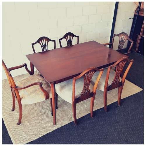An awesome vintage dining room suite w/ a retro table & 6x shield-back chairs including two carvers