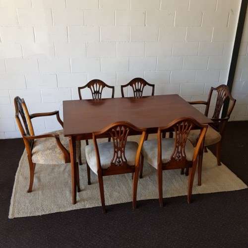 An awesome vintage dining room suite w/ a retro table & 6x shield-back chairs including two carvers