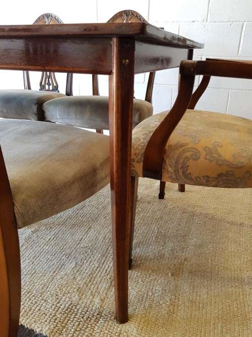 An awesome vintage dining room suite w/ a retro table & 6x shield-back chairs including two carvers