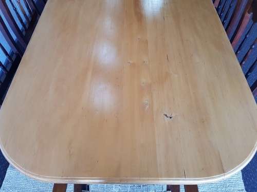 An amazing 8-seater Yellowwood and Imbuia dining suite with 8x stunning riempie dining chairs