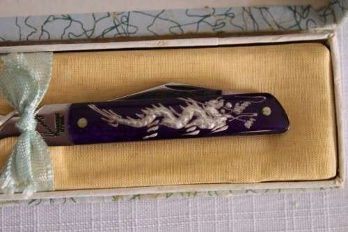 An awesome vintage "Viceroy" stainless steel letter opener with a stunning dragon handle in its box