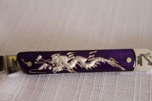 An awesome vintage "Viceroy" stainless steel letter opener with a stunning dragon handle in its box