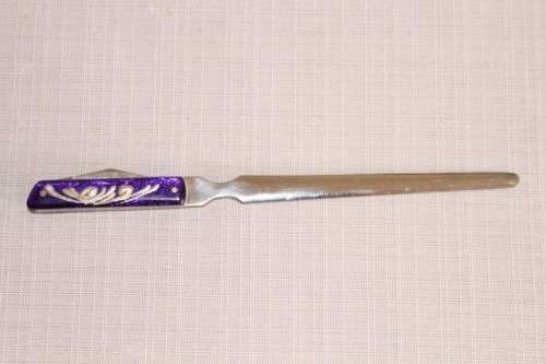 An awesome vintage "Viceroy" stainless steel letter opener with a stunning dragon handle in its box