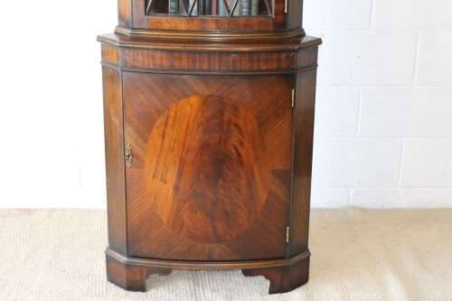 A fantastic Edwardian antique corner display cabinet with a glass door and spacious bottom cupboard