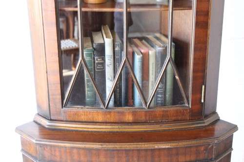 A fantastic Edwardian antique corner display cabinet with a glass door and spacious bottom cupboard
